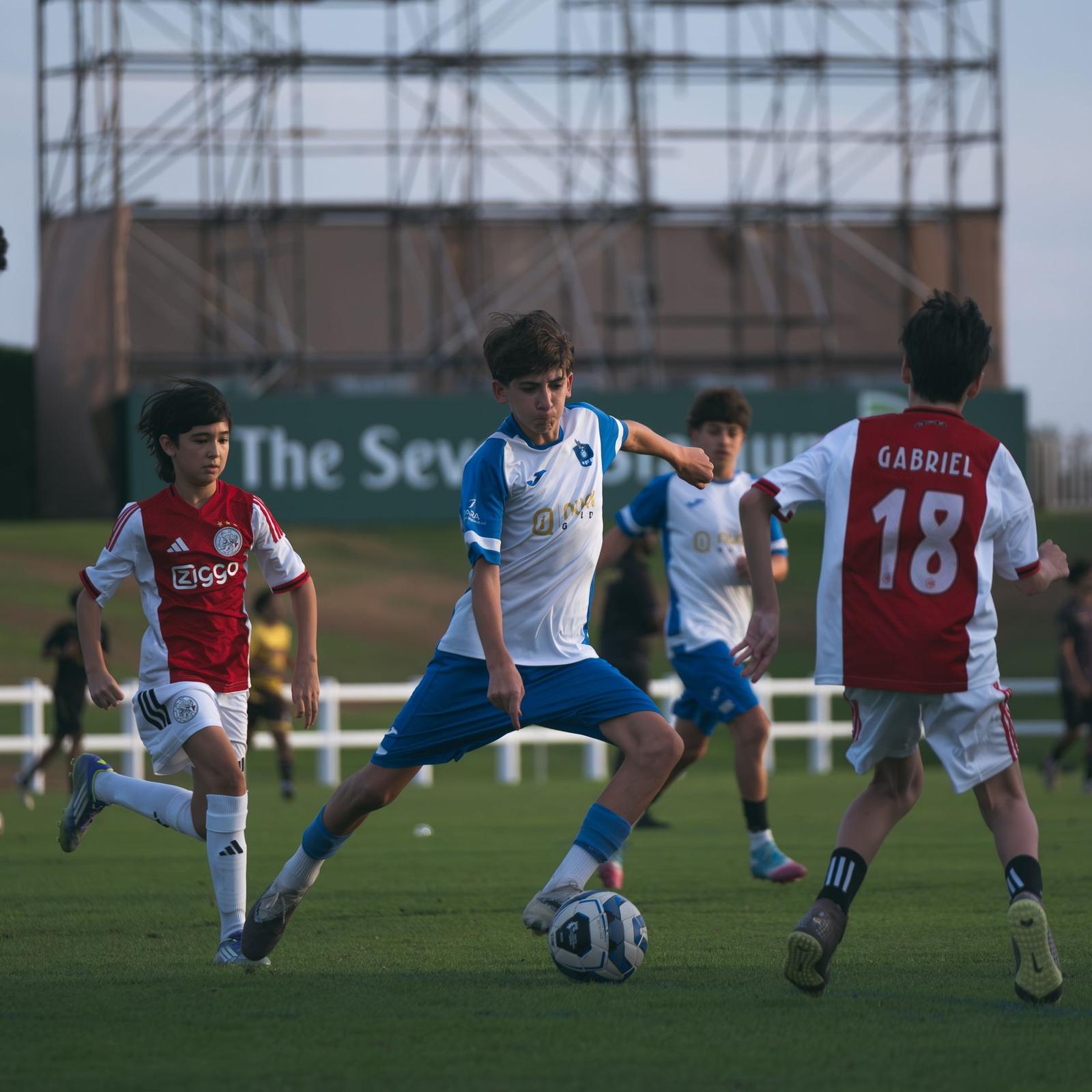 EYFL players compete for the ball at The Sevens